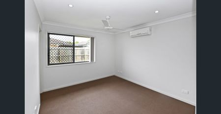 Freshly Updated Family Home in Convenient Logan Reserve Location - Photo 2