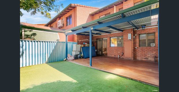 SPACIOUS TOWNHOUSE - Photo 1