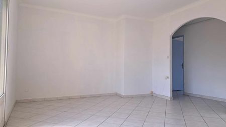 Location - Appartement T4 de 70 m² avec deux balcons et cave - Photo 5