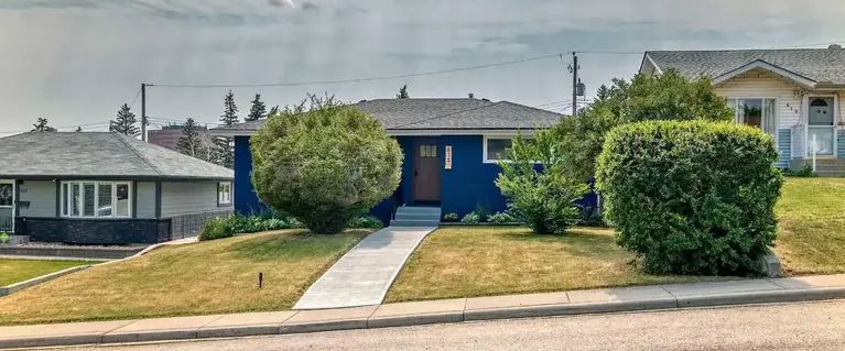 Beautifully Renovated Home with Ideal Access to Train, Schools, and City Center | 615 101 Avenue Southwest, Calgary - Photo 1