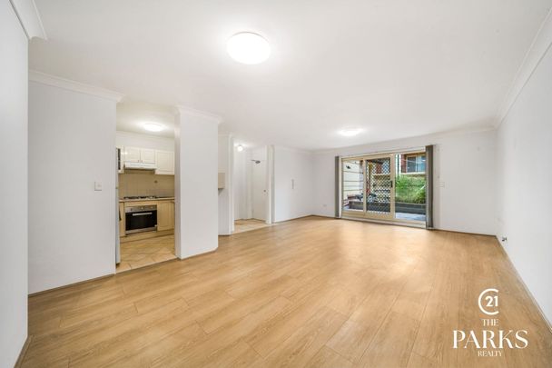 Spacious Apartment with Leafy Outlooks & Resort-Style Pool - Photo 1