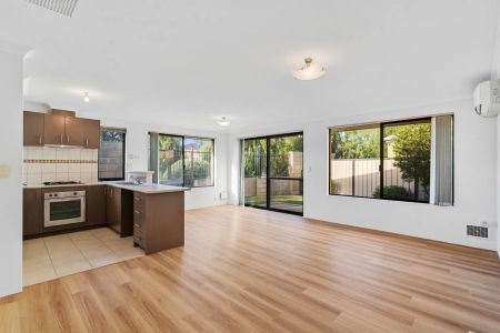 Ideally Located for easy care living - Photo 2