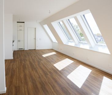 2-Zi.-DG-Wohnung mit eindrucksvollen Panorama-Dachfenstern - offene... - Foto 3