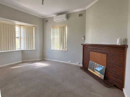 Charming 2-Bedroom Home with Character & Space - Photo 3