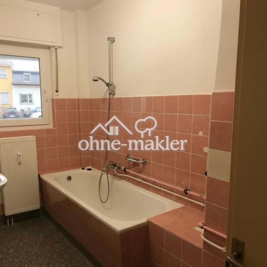 Renovierungsbedürftige Erdgeschosswohnung mit Balkon und Garage in Bingen-Büdesheim - Photo 1