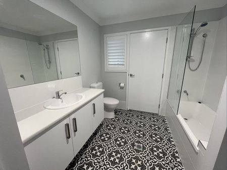 Stylish Modern Home with Ducted A/C & Water Included - Photo 2