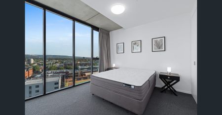 Fully Furnished CBD Apartment with Home office/Study in 2nd Bedroom. - Photo 2