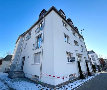 Helle 3-Zimmer-Neubauwohnung mit Terrasse, moderner Einbauküche & P... - Foto 1