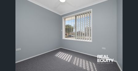 Family Residence with a Fresh Interior - Photo 4