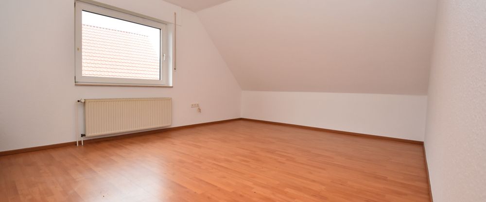 Dachgeschoswohnung mit Garage in ruhiger Siedlungslage in Markhausen - Foto 1