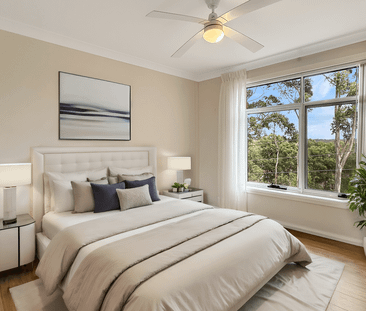 Light Filled Apartment with Oversized Lockup Garage - Photo 5