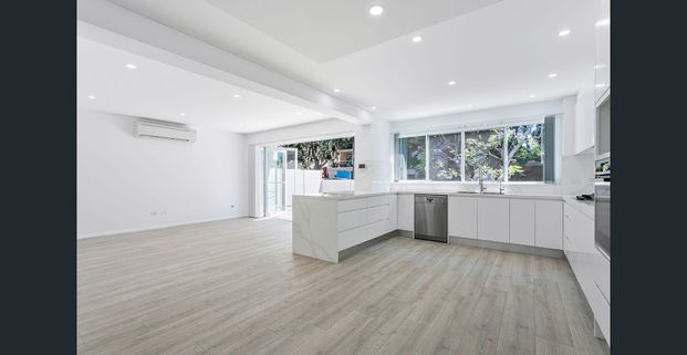 Fully Renovated Four-Bedroom Townhouse - Photo 1