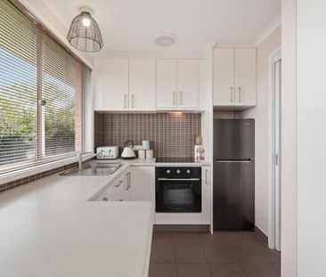 Private, Low-Maintenance Living in Sought-After Oakdowns - Photo 6