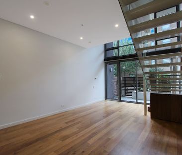 Sunny Split Level Living with Private Courtyard! - Photo 1