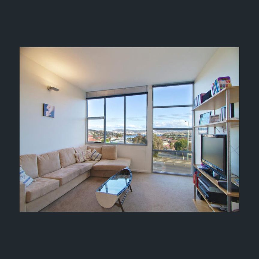 Stylish and Spacious 2-Bedroom Townhouse with Stunning Views -includes power - Photo 1