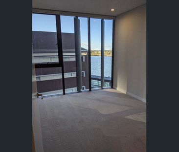 Modern 2 Bedroom 2 Bathroom River Views w/ Infinity Pool - Photo 2