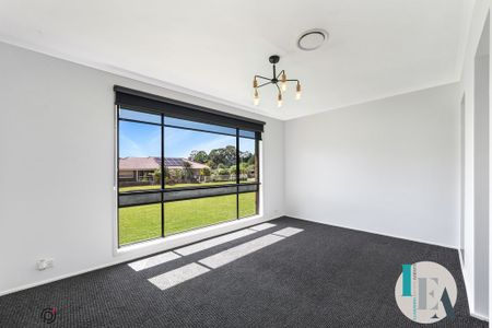 Modern 4-Bedroom Family Home in Prime Albion Park Location - Photo 2