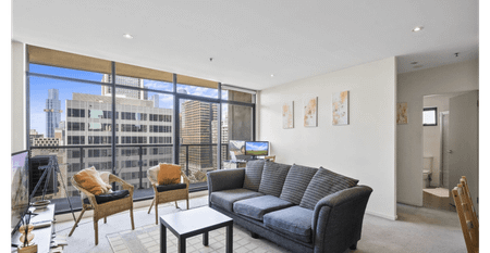 Bright Two-Bedroom Apartment with City Views - Photo 2