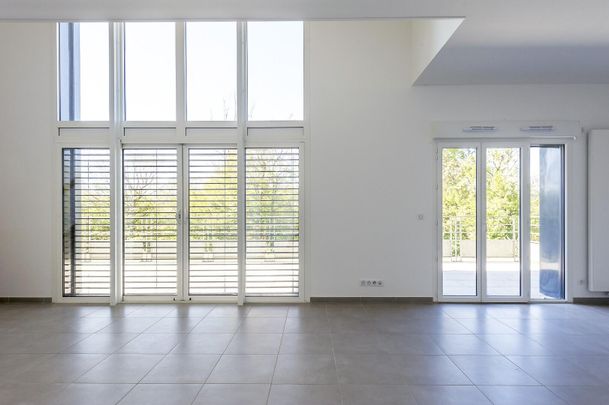 location Appartement T4 DE 132.4m² À SAINT JULIEN EN GENEVOIS - Photo 1