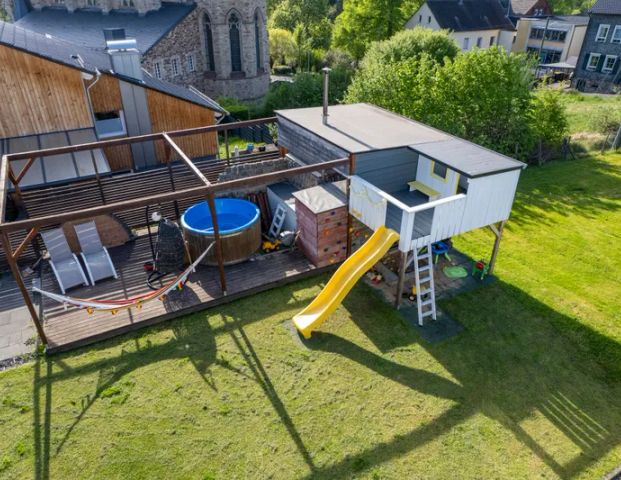 Moderne Erdgeschosswohnung mit Sauna & Garten - Foto 1