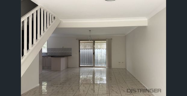 SPACIOUS TOWNHOUSE - Photo 1