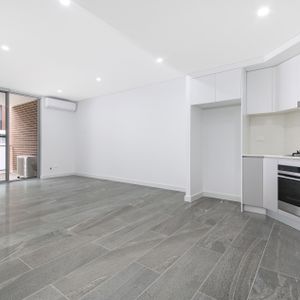 Modern two bedroom unit - 20% below market rent - Photo 2