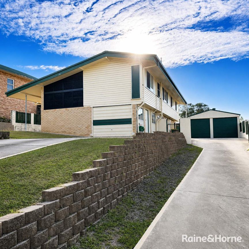 Spacious Family Home with Shed Space & Room to Move - Photo 1