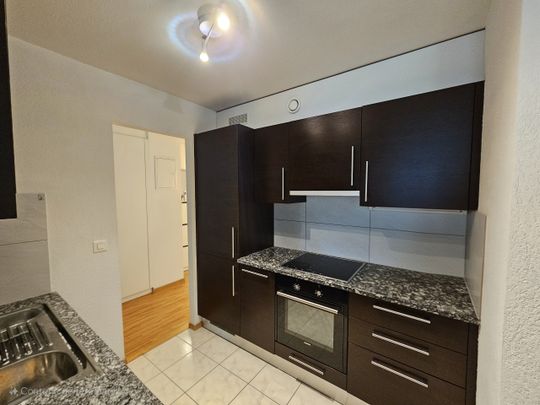 Appartement de 3.5 pièces au rez avec jardin - Photo 1