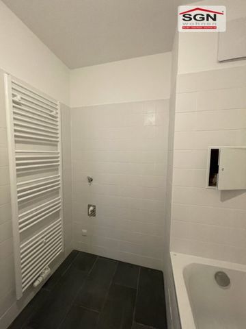 2-Zimmer-EG-Genossenschaftswohnung mit Balkon & Garage - Photo 2