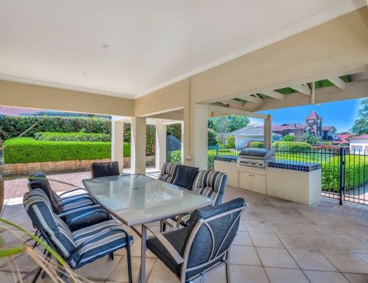 MODERN AND SPACIOUS HOME IN THE EXCLUSIVE MADISON GARDENS! - Photo 1