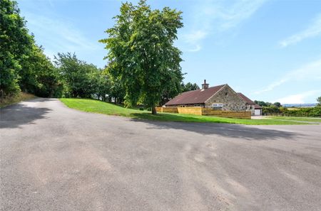 A four bedroom detached bungalow with allocated parking for 2 cars situated in Barlborough. - Photo 3
