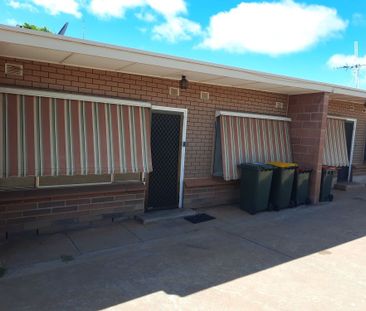 Neat and Tidy unit with own private rear paved courtyard - Photo 2