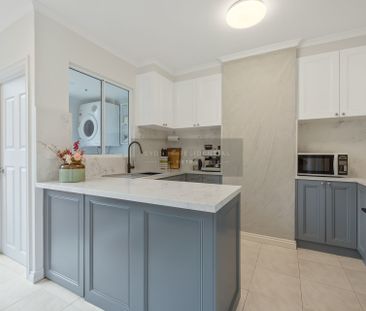 Renovated two-bedroom w/LUG located in the Princeton Building! - Photo 2