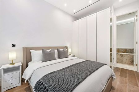 Remarkable 2 bedroom, 2 bathroom luxury apartment with concierge and gym, in an exclusive development enviably located just south of St. James's Park. - Photo 5