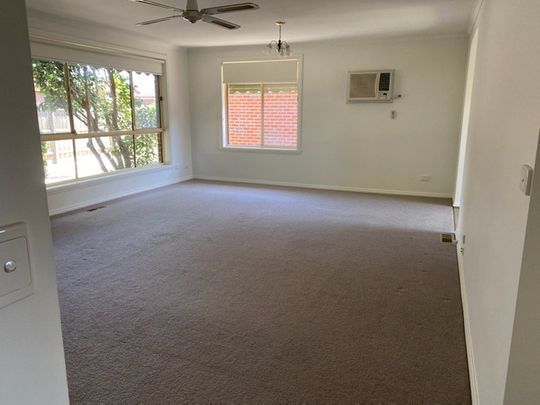 PRIVATE UNIT WITH REAR YARD - Photo 1