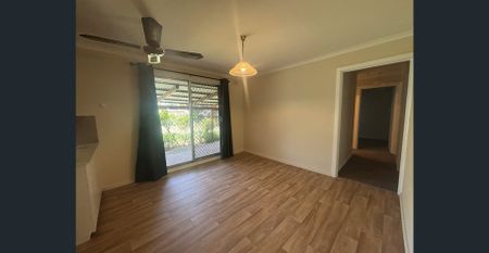 Comfortable 3-Bedroom Home with Spacious Backyard - Photo 3