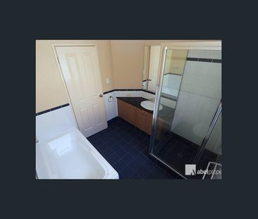 EXECUTIVE TOWNHOUSE CLOSE TO EVERYTHING! - Photo 1