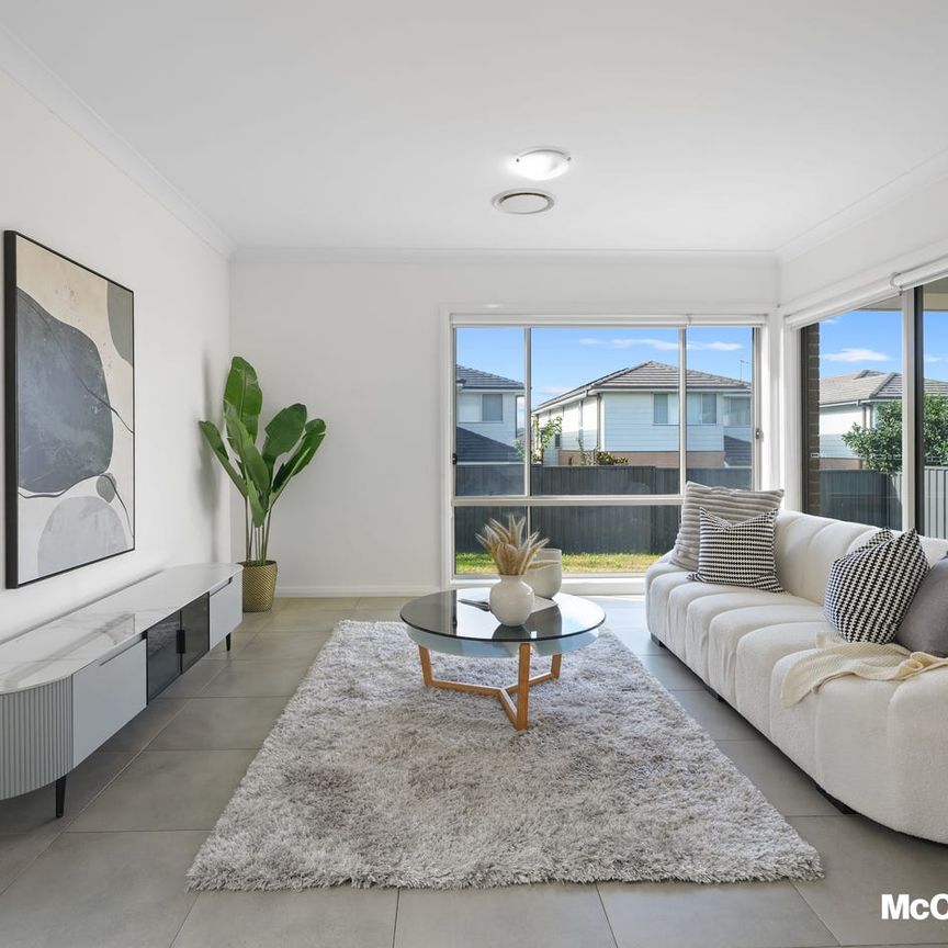Discover Contemporary Family Living with Potential for Five Bedrooms & Versatile Living Spaces - Photo 1