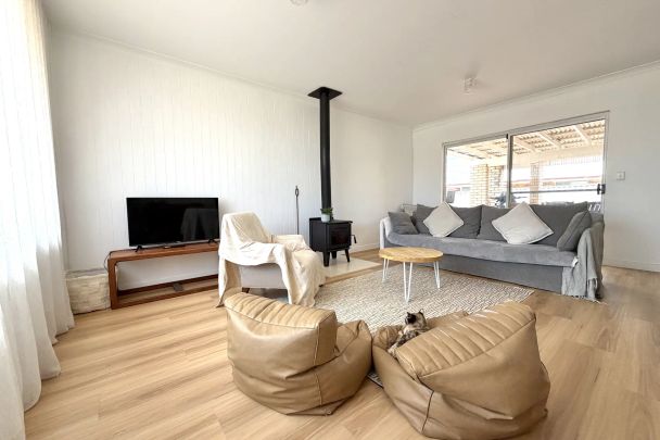 Coastal Charm - 4 Bedroom Home in Sought-After Halls Head - Photo 1