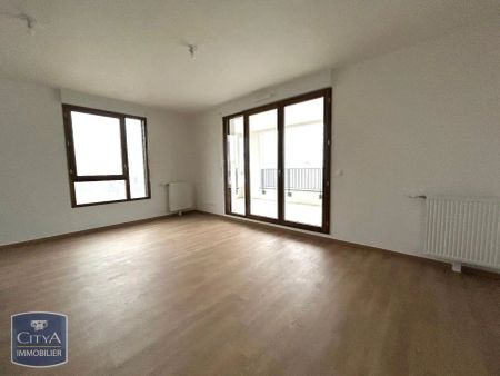 Appartement à louer 3 pièces 61.7m² - Photo 2