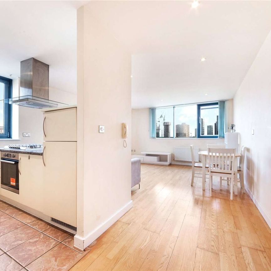 This property is conveniently situated in zone 2, providing excellent transportation connections to central London, with easy access to All Saints DLR station nearby. - Photo 1