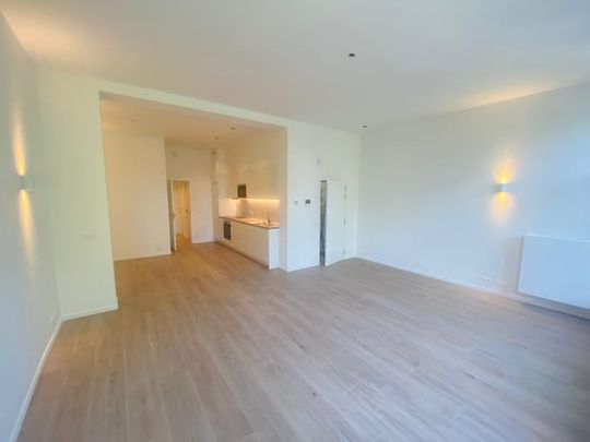 Appartement te huur - foto 1
