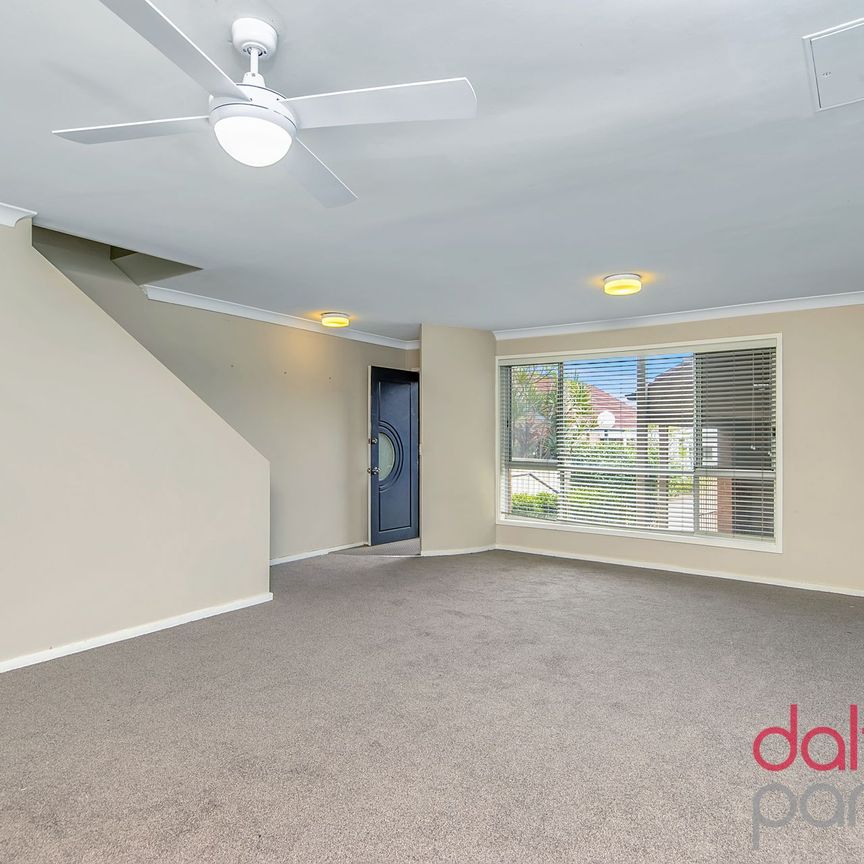 Three Bedroom Townhouse in Perfect Location! - Photo 1