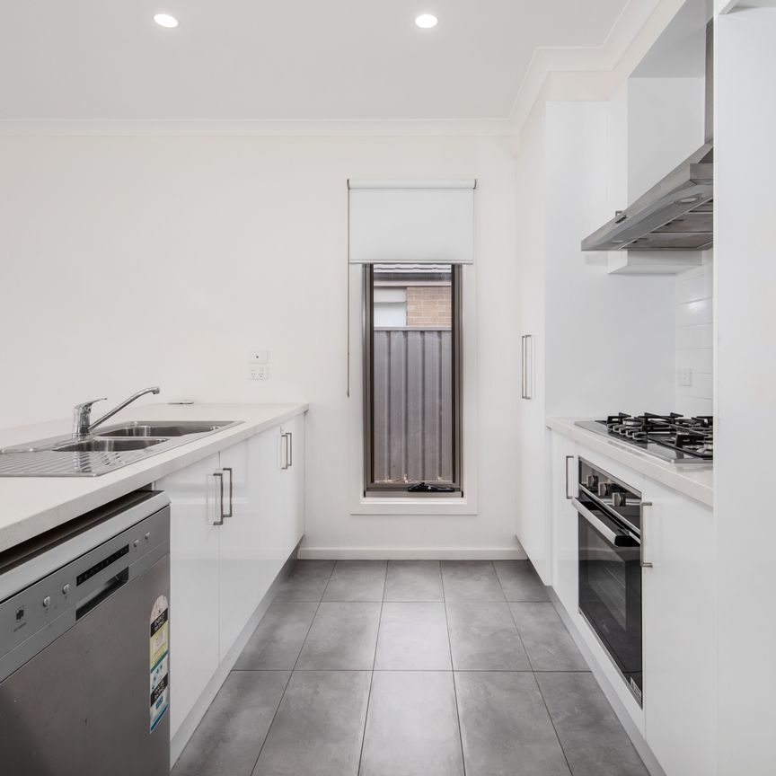 Sleek Style Meets Space: Contemporary Four-Bedroom Home in Highly Sought-After Weir Views - Photo 1