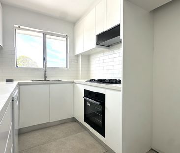 FULLY RENOVATED FLOOR 2 BEDROOM UNIT 500M TO AUBURN STATION - Photo 4
