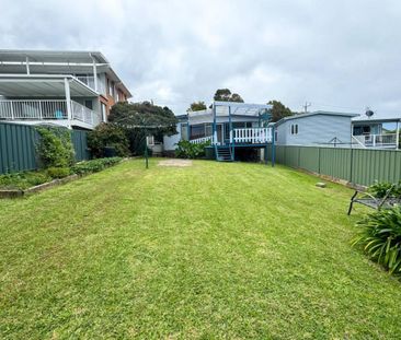 Cozy 2-Bedroom Home with Large Backyard & Covered Deck! - Photo 3