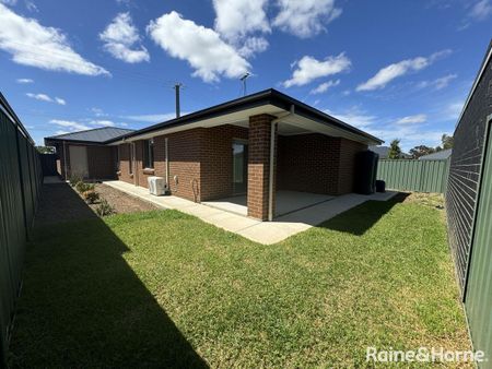 Four Bedroom - Two Living Home in Evanston Gardens! - Photo 3