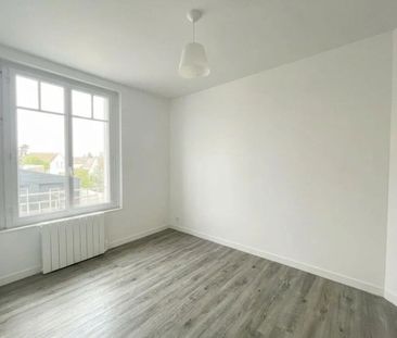 A LOUER - APPARTEMENT DE 2 PIECES AVEC PARKING - Photo 3