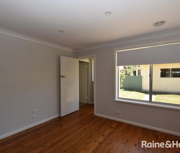 UPDATED FAMILY HOME IN CLOSE PROXIMITY TO SCHOOLS, PARKS AND THE CBD - Photo 4