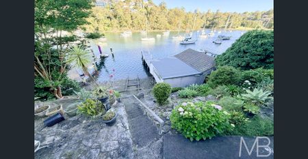 TRANQUIL WATERFRONT RETREAT WITH CAPTIVATING BAY VIEWS - Photo 3